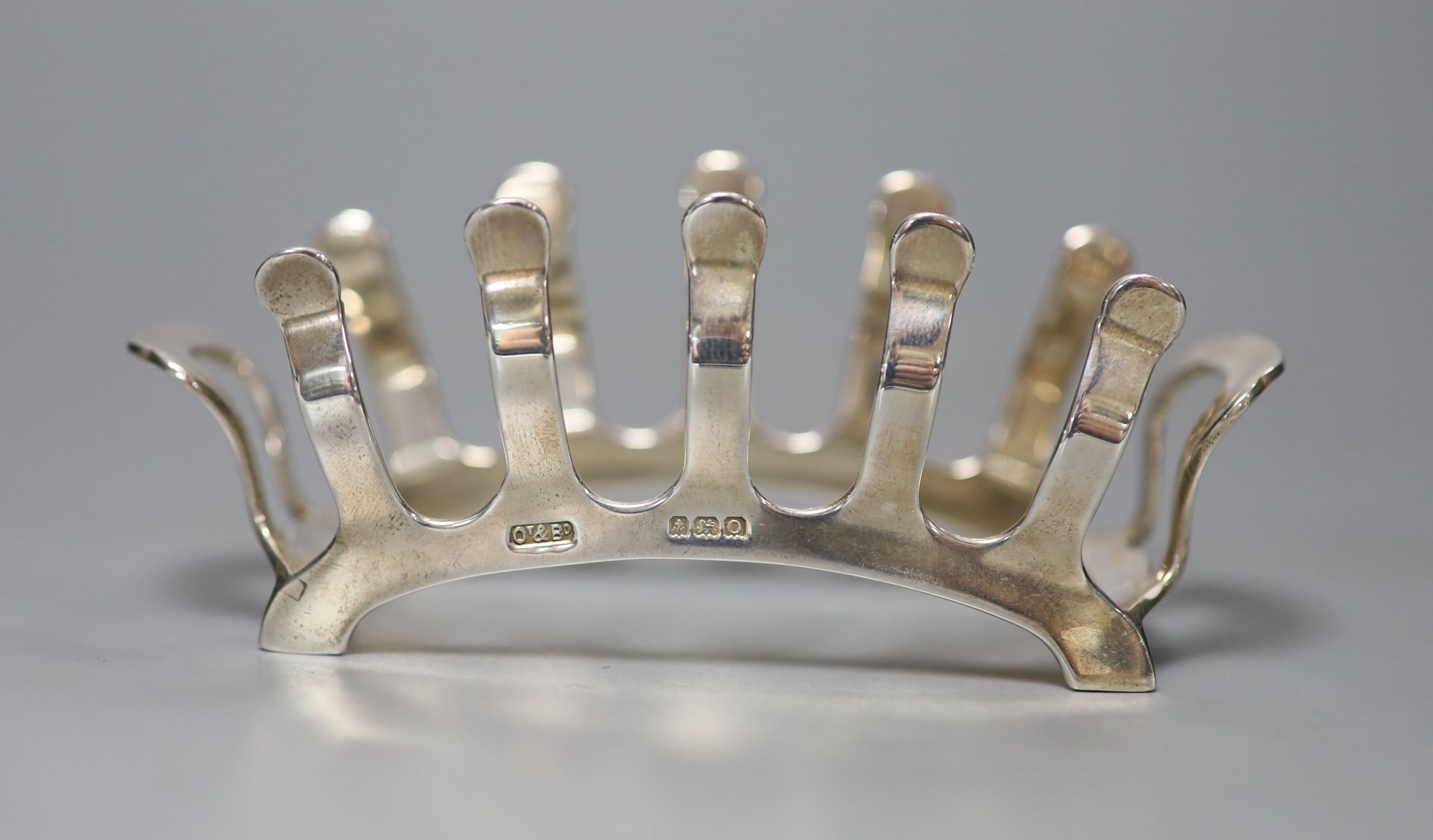 A George VI silver four division toast rack, Ollivant & Botsford, Birmingham, 1938, 11.5cm, 2oz.